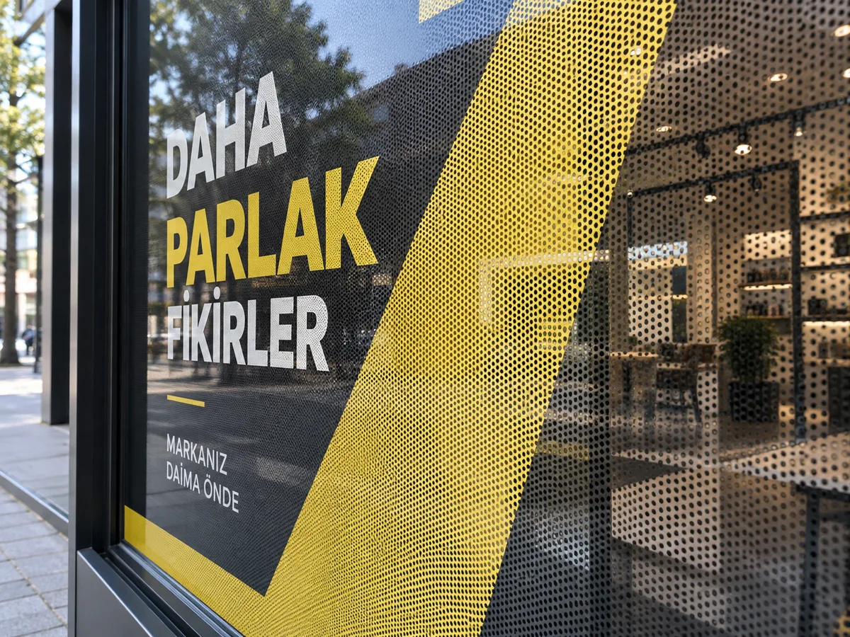 Mağaza camında delikli one way vision folyo detayı
